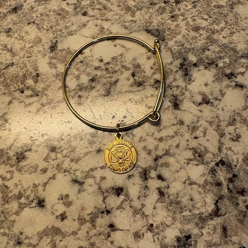 Girl Scouts of America gold toned adjustable bangle and charm